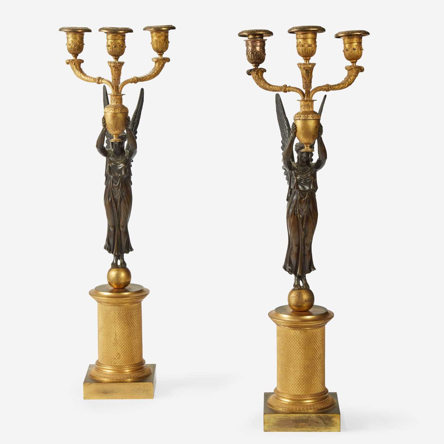 Lot 40 - A Pair of Empire Gilt and Patinated Bronze Figural Three-Light Candelabra