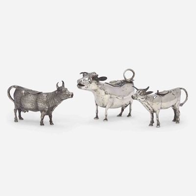 Lot 53 - A group of three Continental silver cow creamers