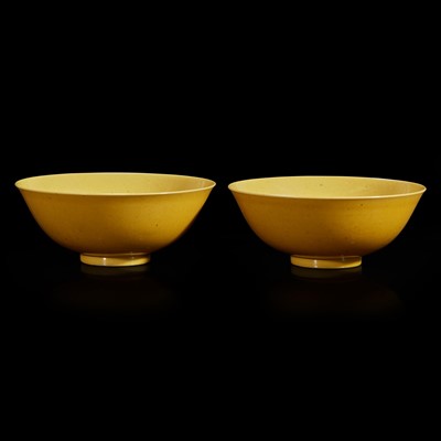 Lot 67 - A pair of Chinese yellow-glazed porcelain bowls