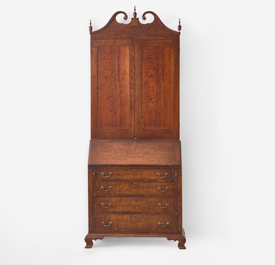 Lot 65 - A Chippendale figured walnut desk and bookcase