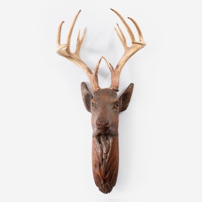 Lot 140 - A Swiss Black Forest Carved Wood Stags Head