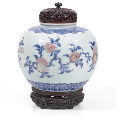 Lot 37 - A Chinese underglaze blue and red porcelain jar 清花釉里红三多罐