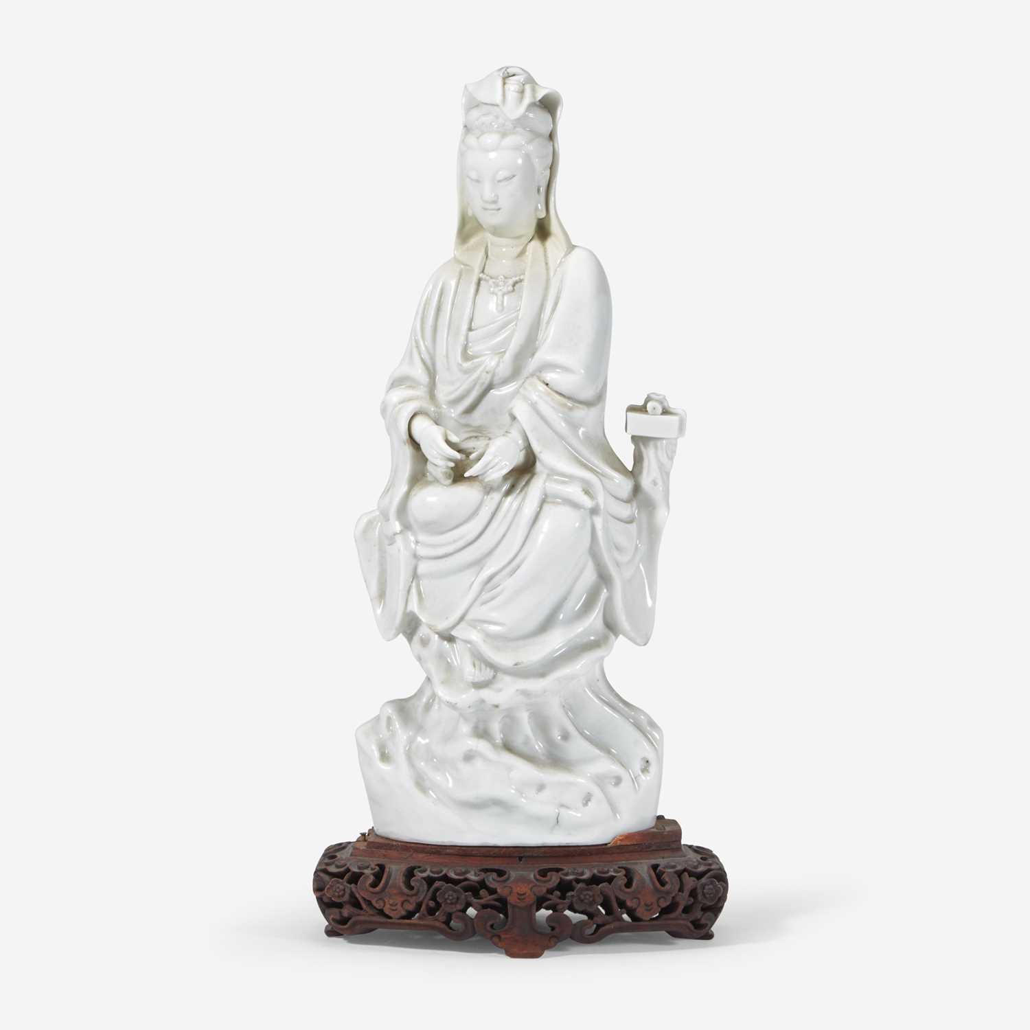 Lot 44 - A Chinese Dehua porcelain figure of Guanyin