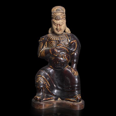 Lot 31 - A Chinese brown glazed figure of Guandi 关帝像