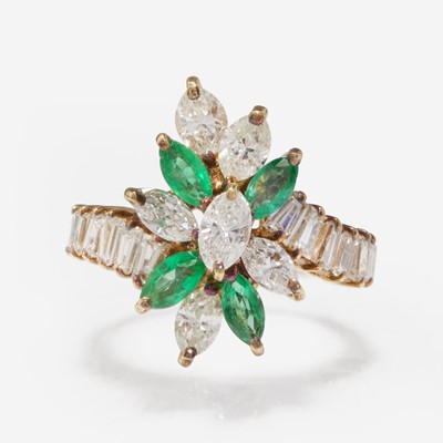Lot 281 - A 14K Yellow Gold, Emerald, and Diamond Ring