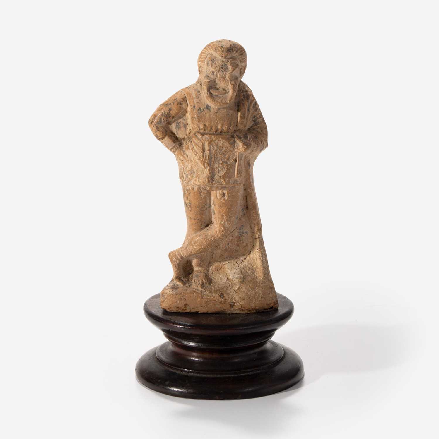 Lot 8 - An Ancient Greek Terracotta Figurine of a Comic Actor