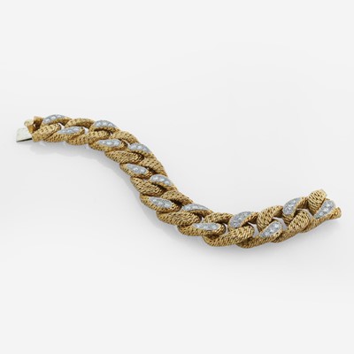 Lot 47 - An 18K yellow gold and diamond curb link bracelet, Tiffany & Co.