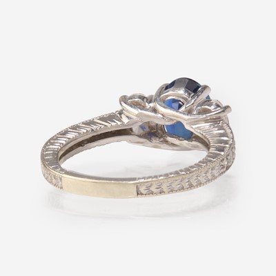Lot 293 - A Sapphire and Diamond White Gold Ring