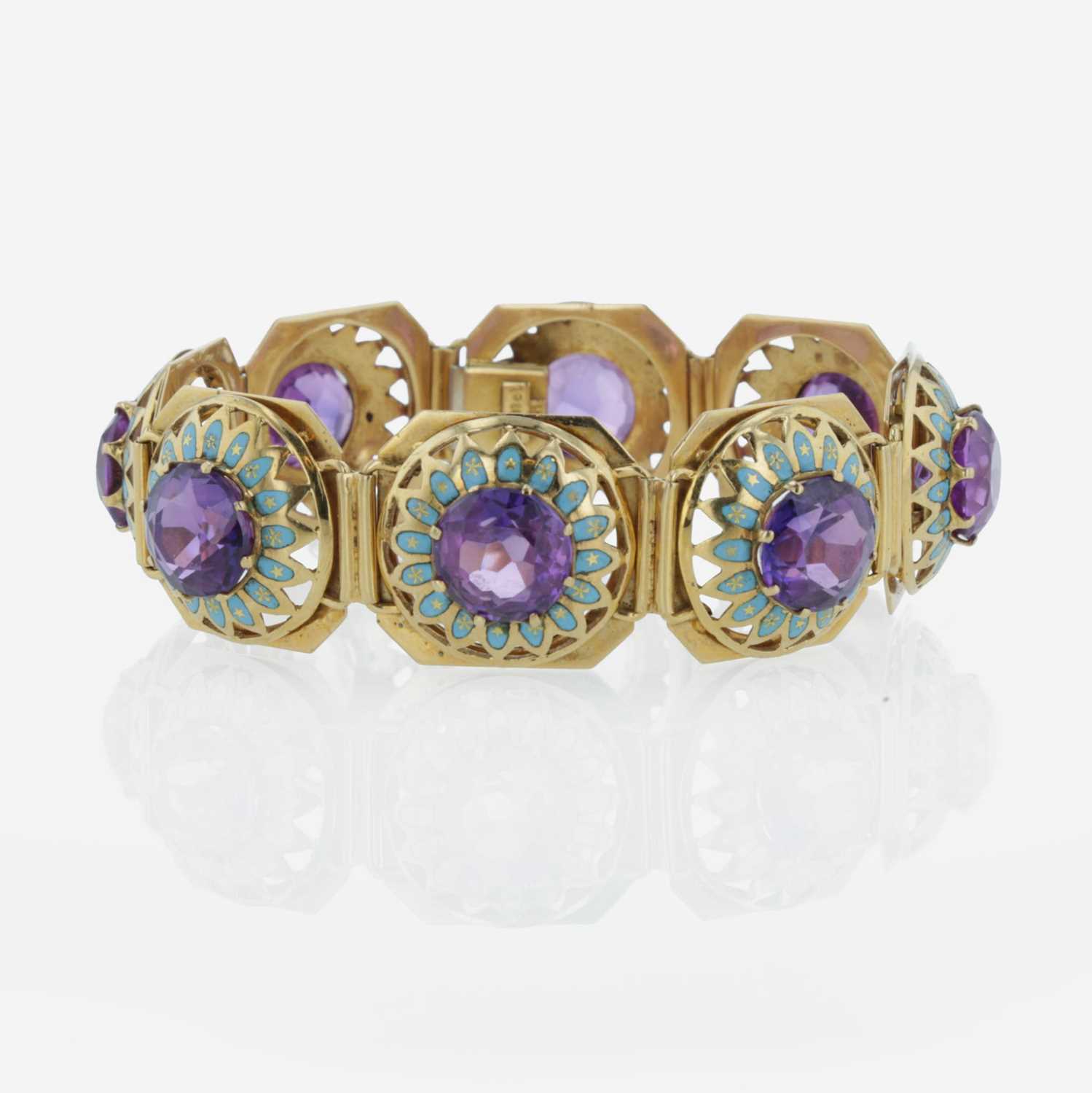 Lot 34 - An 18K yellow gold, synthetic sapphire, and enamel bracelet