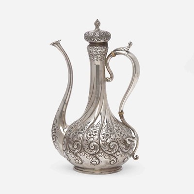 Lot 82 - A sterling silver repoussé after-dinner coffeepot