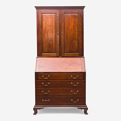 Lot 58 - A Chippendale carved mahogany desk and bookcase