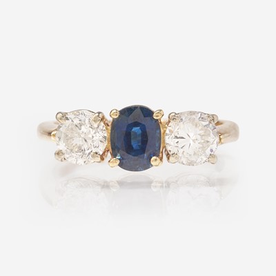 Lot 291 - Three-Stone Sapphire and Diamond Ring
