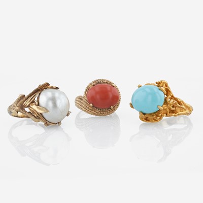 Lot 17 - A collection of three 14K yellow gold and gem-set rings