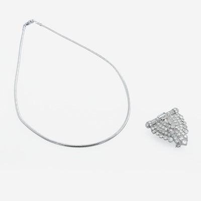 Lot 79 - An art deco,  platinum and diamond dress clip - pendant, and necklace