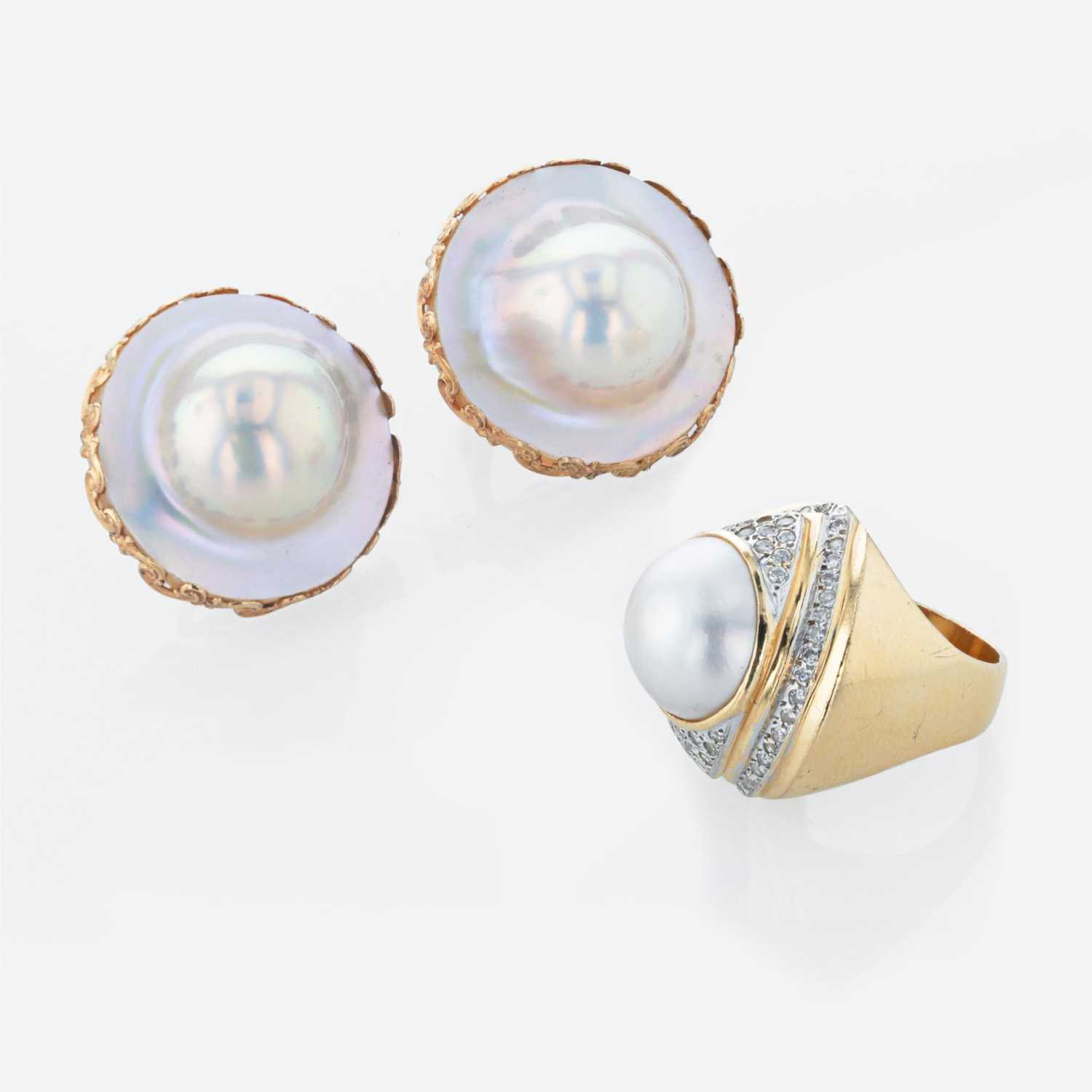 Lot 93 - A 14K yellow gold pair of earrings and pearl and diamond ring