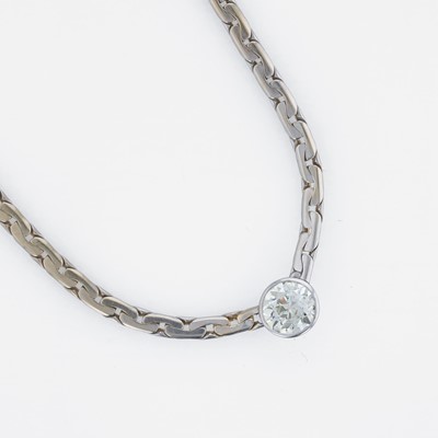 Lot 82 - A 14K, white gold diamond station necklace