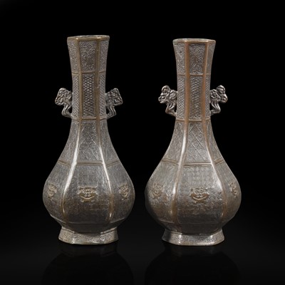 Lot 19 - A pair of Chinese patinated bronze hexagonal bottle vases 铜加漆六边方瓶一对