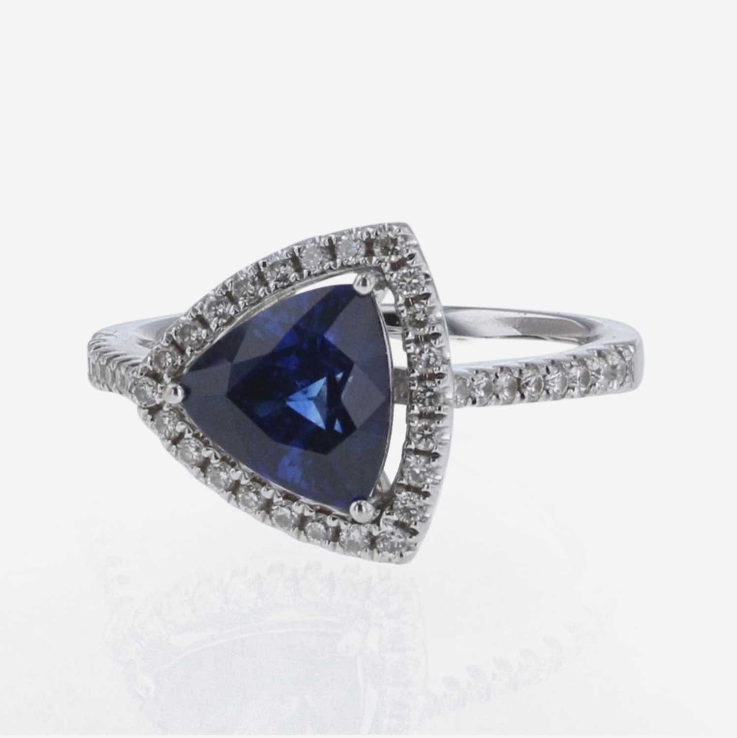 Lot 295 - Sapphire, Diamond, and 18K White Gold Chow Tai Fook Ring