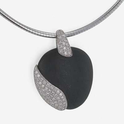 Lot 241 - An 18K White Gold, Black Stone, and Diamond Necklace by Movado