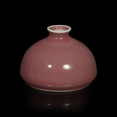 Lot 61 - A Chinese copper-red glazed water coupe, Taibo zun 釉里红水丞