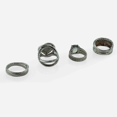 Lot 239 - A Collection of Four Sterling Silver David Yurman Rings