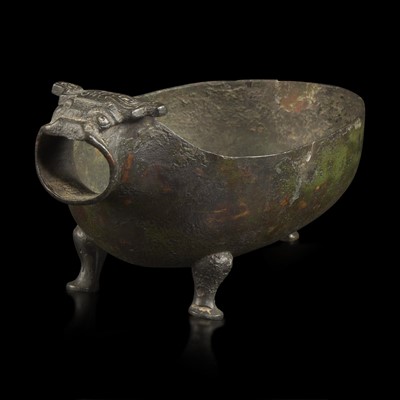 Lot 3 - A Chinese archaic bronze animal-form pouring vessel, Yi 青铜兽形匜