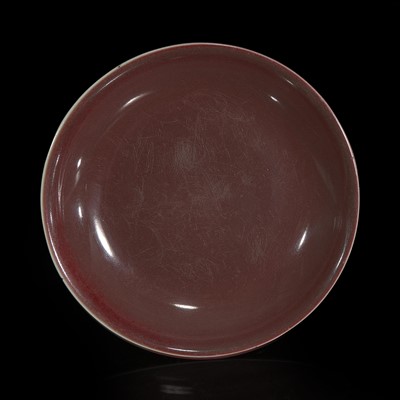 Lot 55 - A Chinese copper-red glazed dish 釉里红碟子