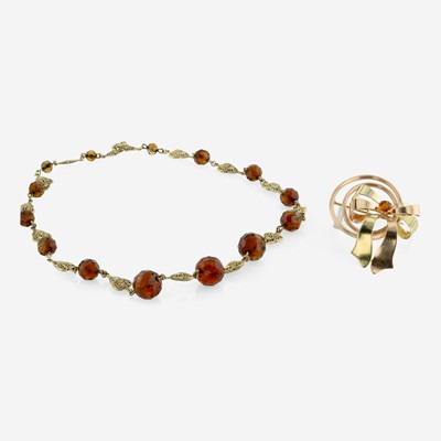 Lot 335 - A Garnet Pendant and Citrine Necklace