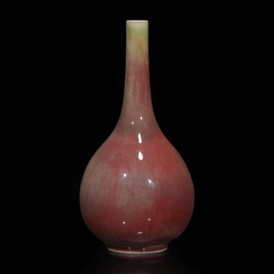Lot 54 - A fine Chinese "Peach bloom"-glazed bottle vase 豇豆红纸槌瓶