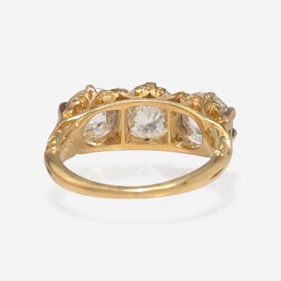 Lot 200 - A Three-Stone Diamond and Yellow Gold Ring