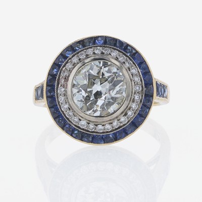 Lot 44 - A Diamond and Sapphire Ring
