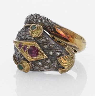 Lot 349 - A Silver and Gold Men's Ring with Emeralds and Rubies