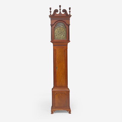 Lot 93 - A Chippendale carved mahogany tall case clock