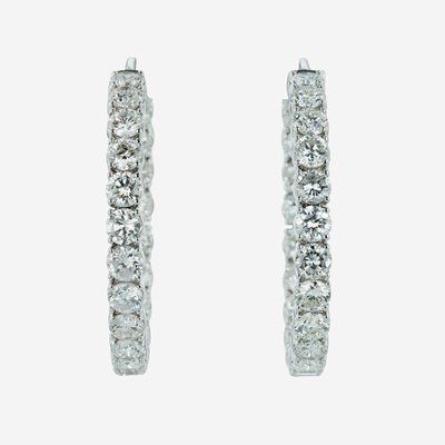 Lot 43 - A Pair of Diamond and 18K White Gold Hoop Earrings