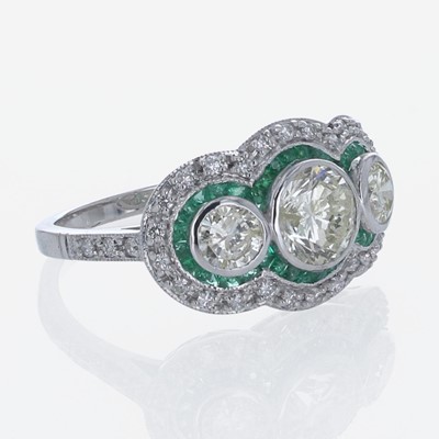 Lot 205 - A Diamond, Emerald, and 18K White Gold Ring