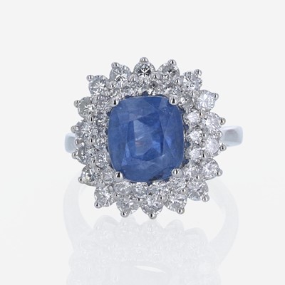 Lot 298 - A Sapphire, Diamond, and 18K White Gold Ring