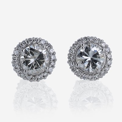 Lot 306 - A Pair of 18K White Gold Halo Diamond Stud Earrings