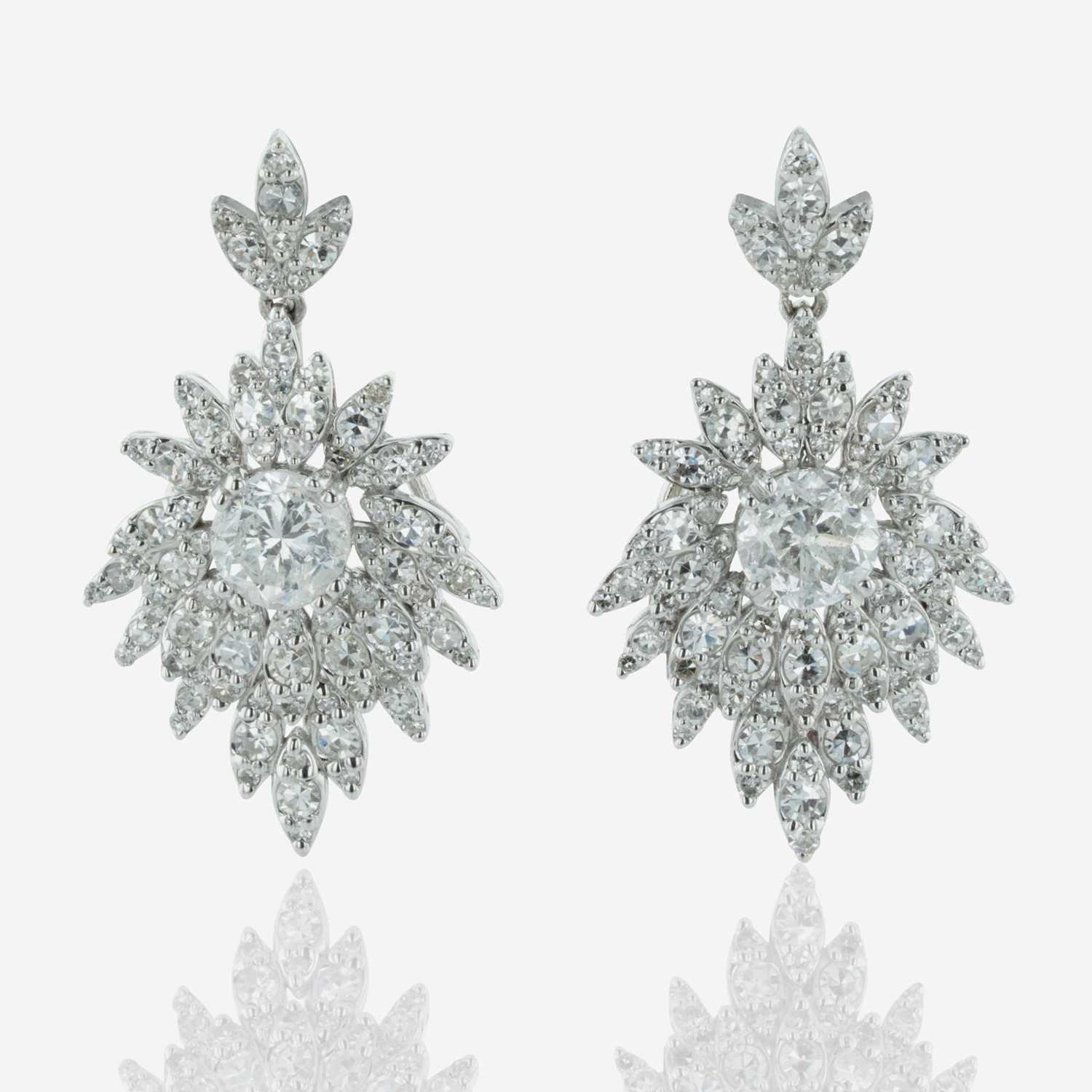 Lot 212 - A Pair of 18K White Gold and Diamond Earrings