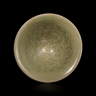 Lot 32 - A small celadon-glazed molded conical bowl, Yaozhou 耀州窯斗笠盞