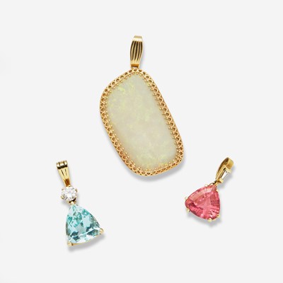 Lot 143 - A Collection of Three 14K Yellow Gold and Gemstone Pendants