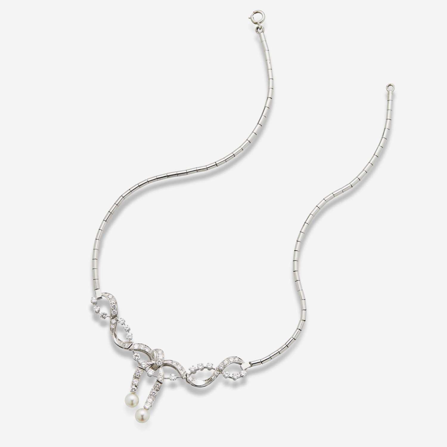 Lot 77 - A 14K White Gold, Diamond, and Pearl Necklace