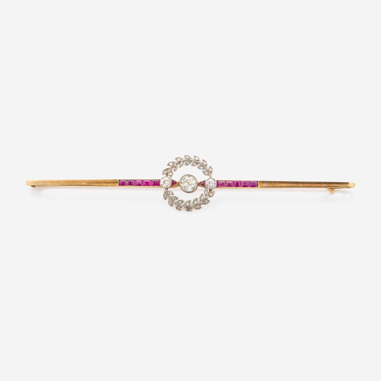 Lot 9 - A 14K Yellow Gold, Platinum, Ruby, and Diamond Brooch