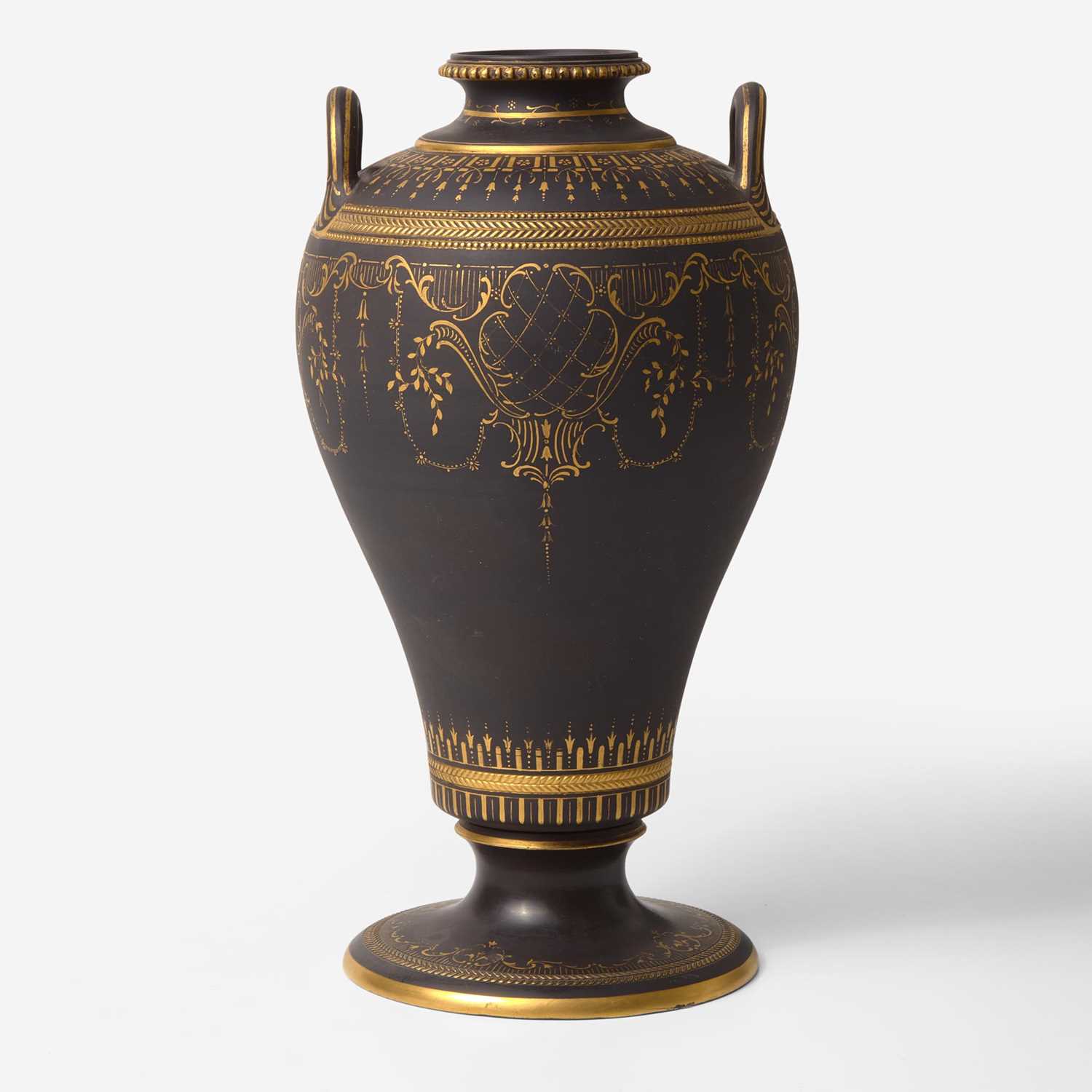 Lot 59 - A Wedgwood Gilded Black Basalt Handled Vase