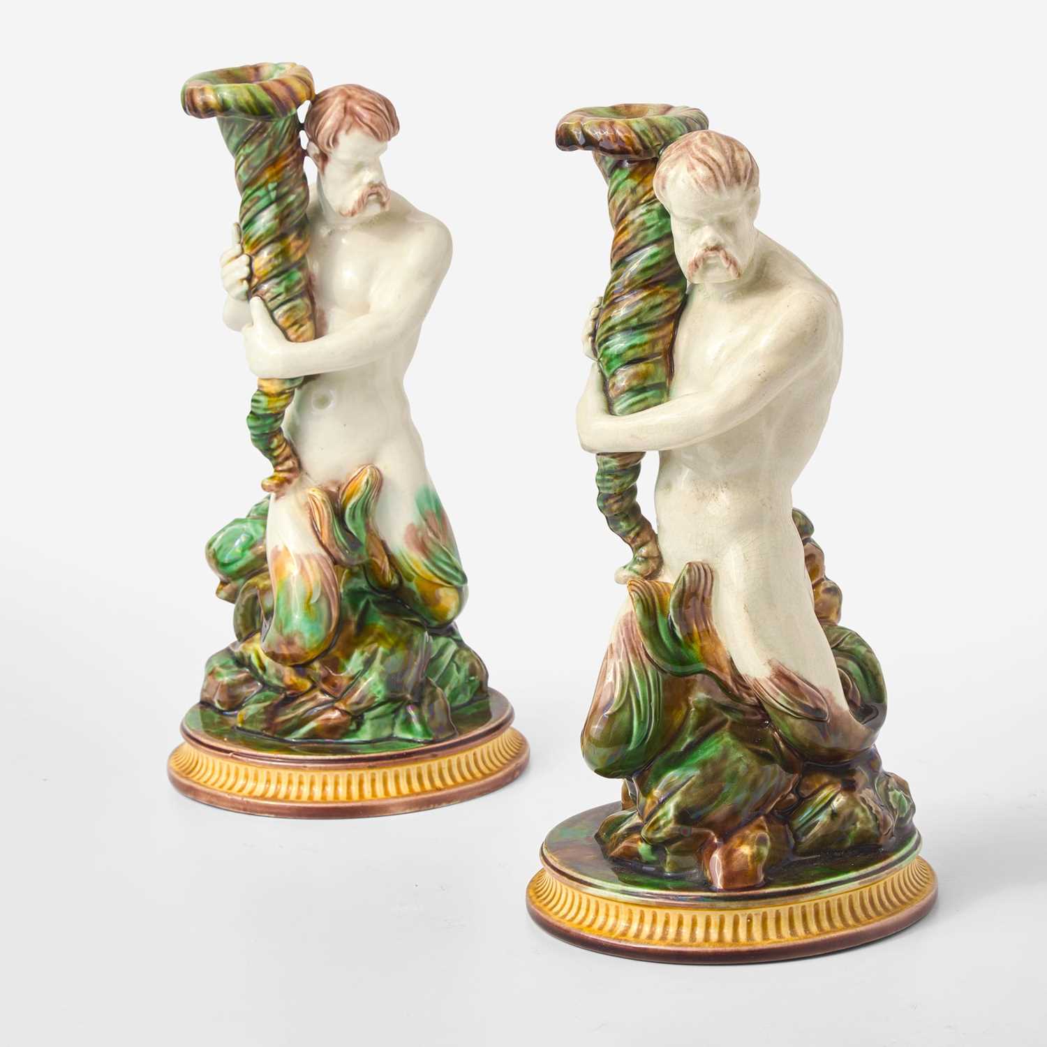 Lot 108 - An Assembled Pair of Wedgwood Majolica Assembled Triton Candle Holders