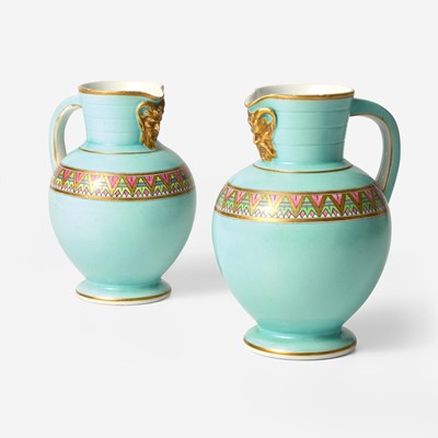 Lot 141 - A Near Pair of Wedgwood Doric Jugs with Egyptian Decoration Designed by Christopher Dresser (1834-1904)