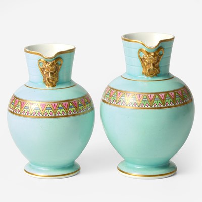 Lot 141 - A Near Pair of Wedgwood Doric Jugs with Egyptian Decoration Designed by Christopher Dresser (1834-1904)