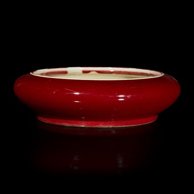 Lot 97 - A Chinese copper-red glazed narcissus bowl 釉裡紅鏜鑼洗