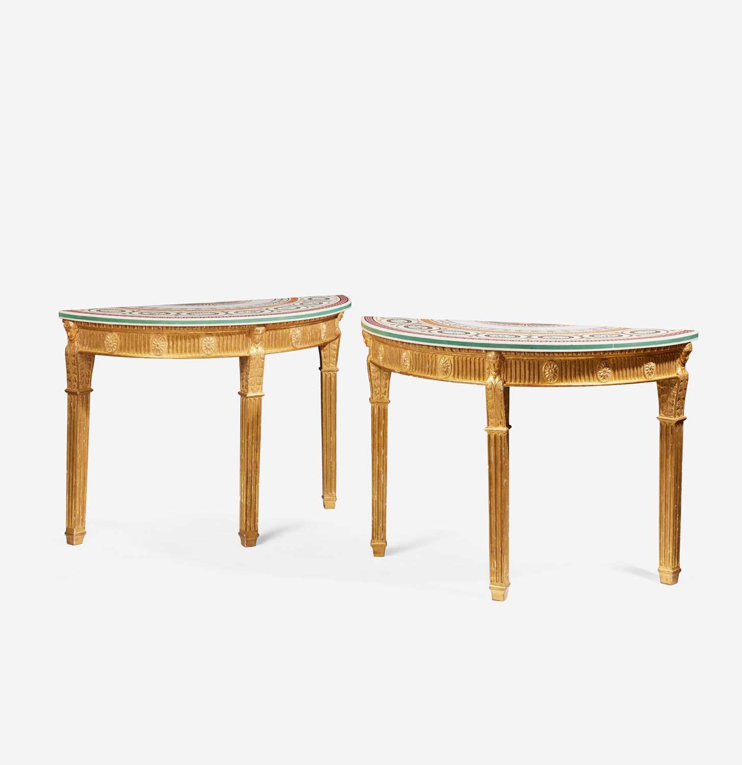 Lot 25 - A pair of George III scagliola inlaid and giltwood demilune tables