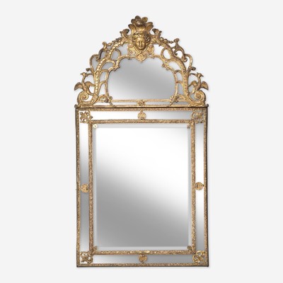 Lot 2 - A late Louis XIV giltwood glass-bordered mirror