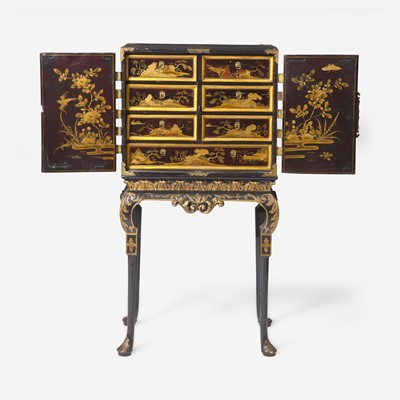 Lot 12 - A Chinese Export gilt-decorated black lacquer table cabinet on a George I gilt-decorated and ebonized stand